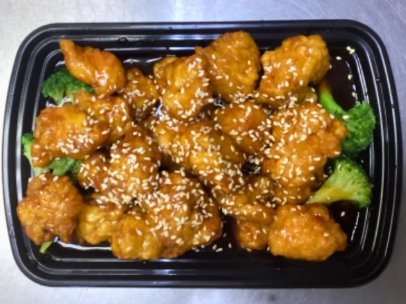 Sesame chicken with broccoli at China Panda, an Chinese Restaurant in Dallas